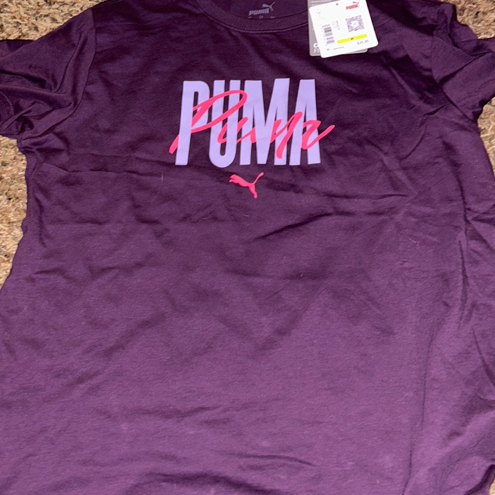 Never worn.  Puma shirt/ tags still attached.